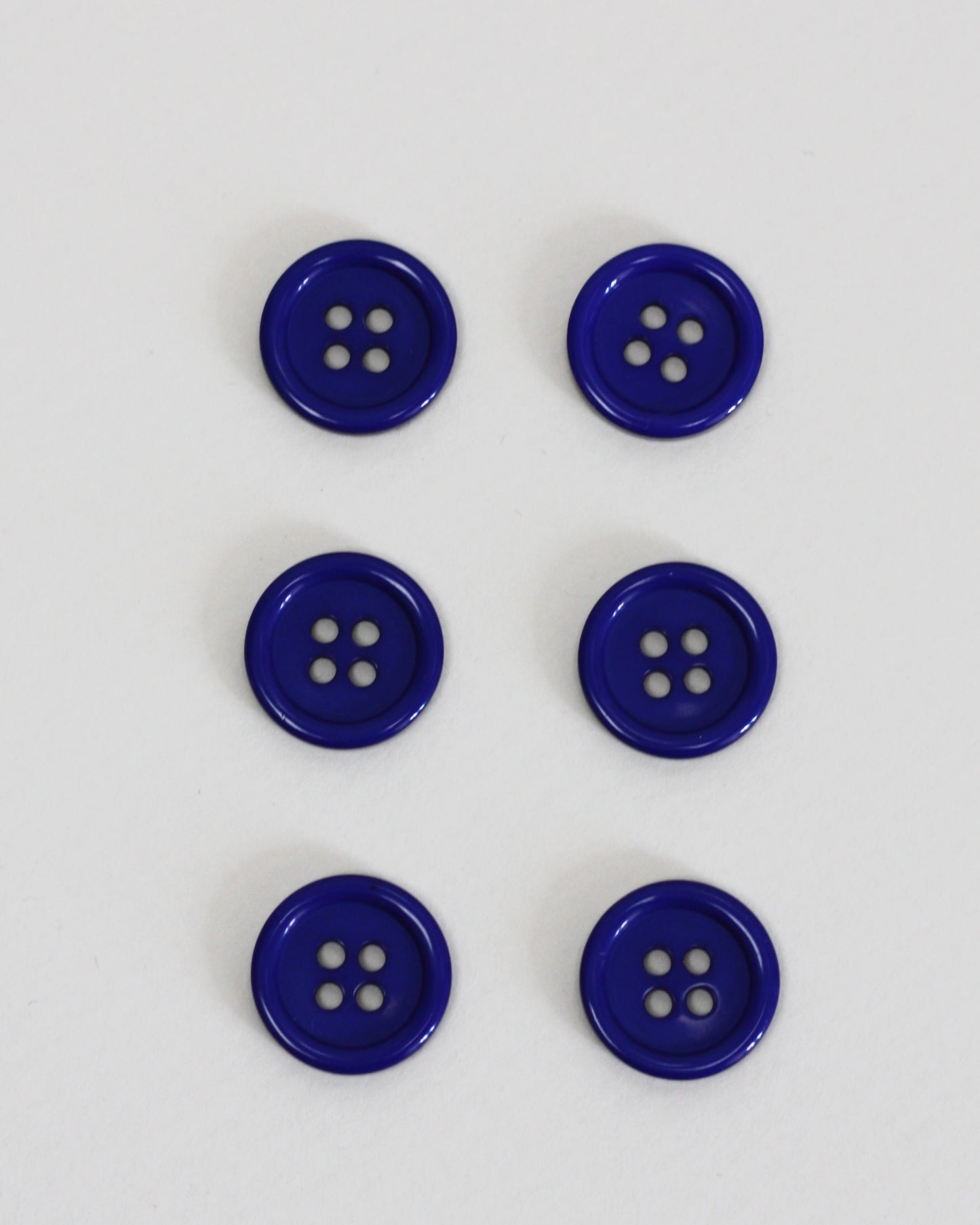 Bouton rond 15 mm 4 trous