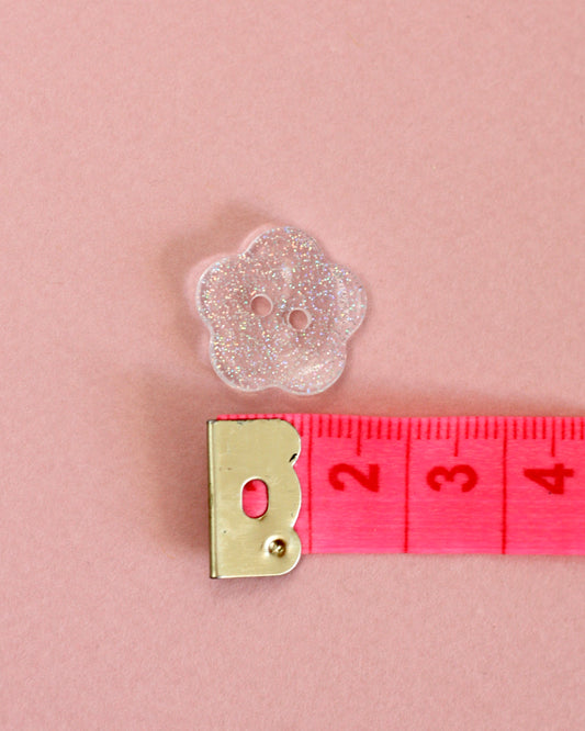 boutons fleur 17 mm transparent à paillettes