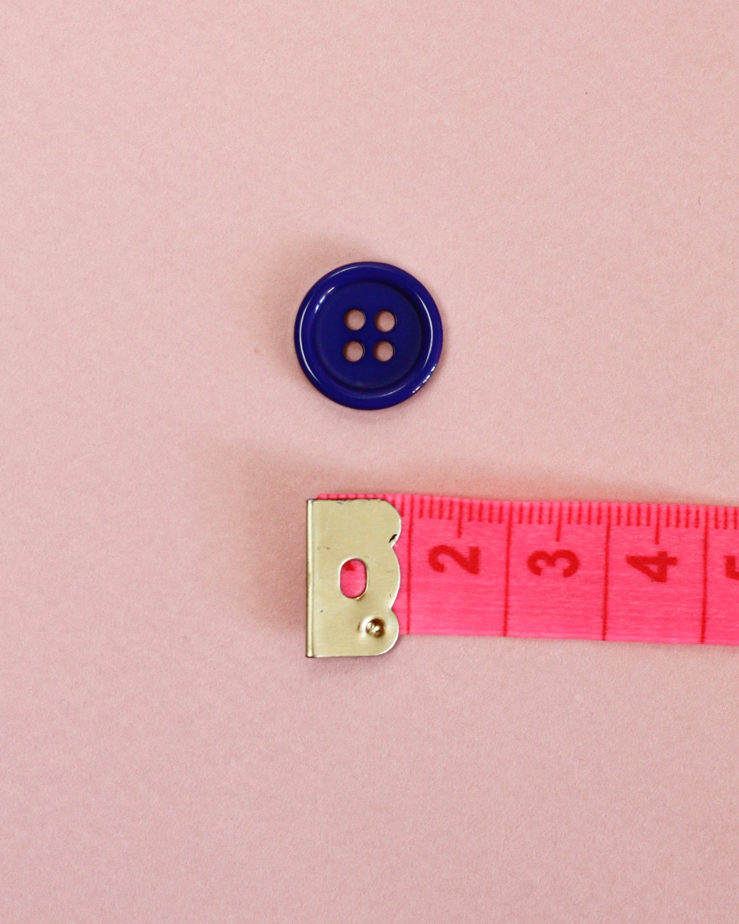 Bouton rond 15 mm 4 trous